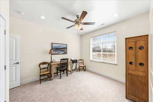 Office featuring light colored carpet, a ceiling fan, and recessed lighting