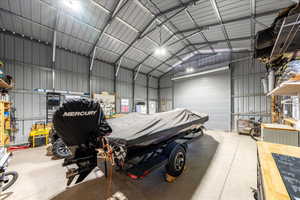 Garage featuring metal wall