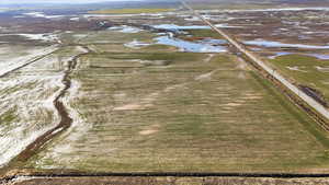 Aerial view of property and surrounding area featuring rural landscape