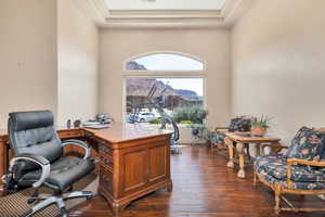 Office space featuring a mountain view and dark wood finished floors
