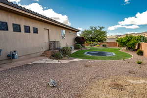 View of fenced backyard