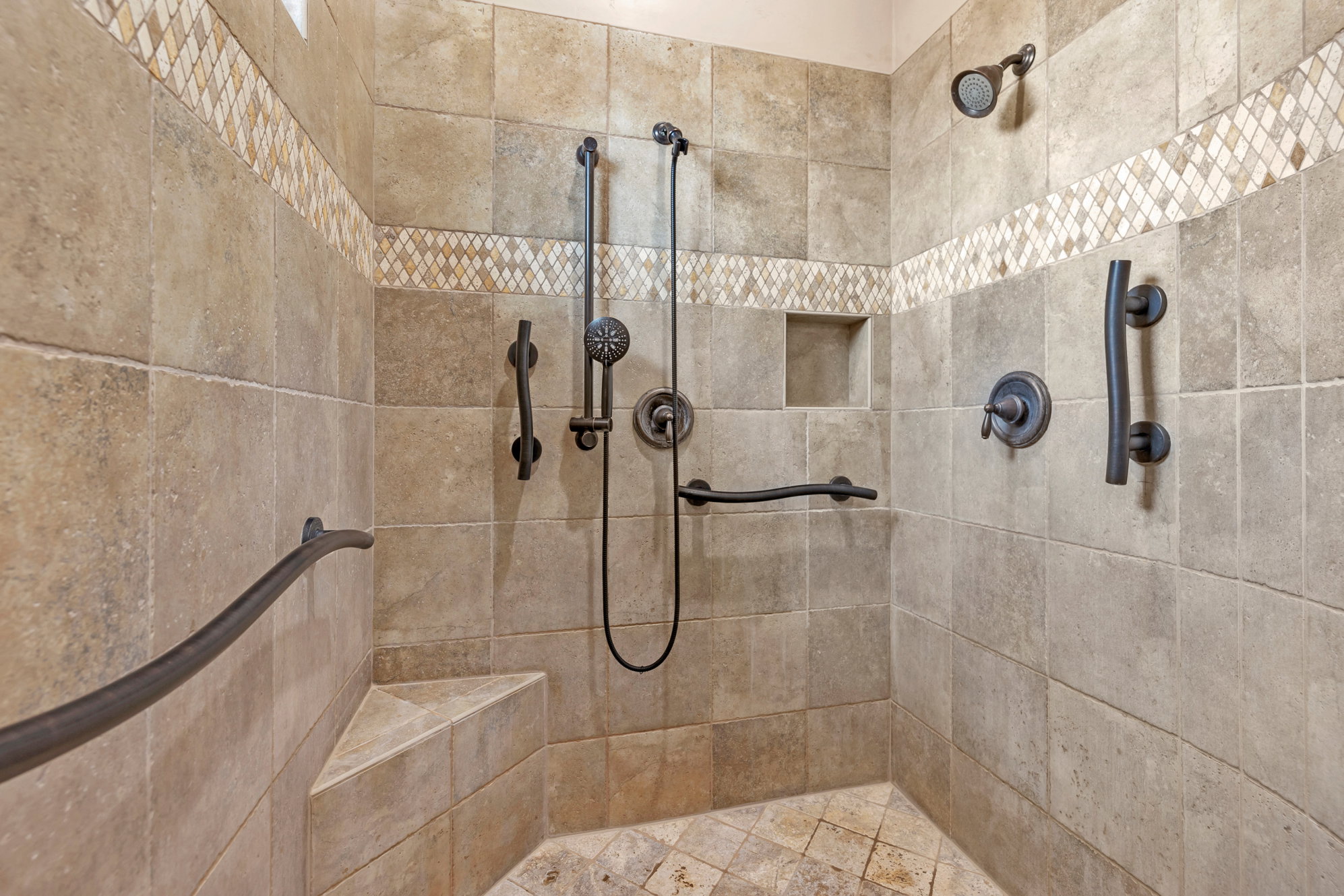 Full bathroom featuring tiled shower
