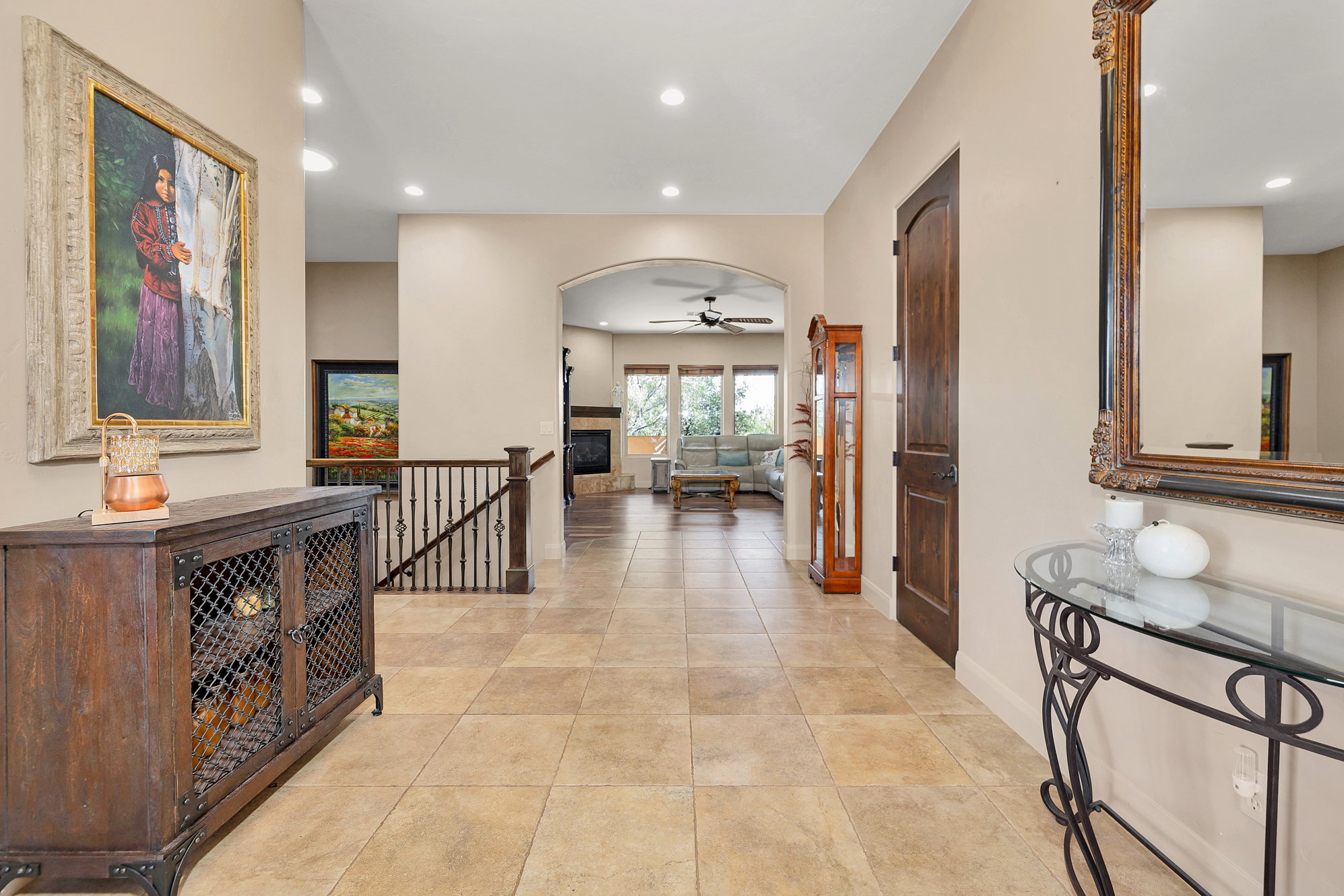 Corridor featuring recessed lighting, an upstairs landing, and light tile patterned floors