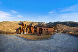 View of front of home with a mountain view