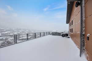 View of yard covered in snow
