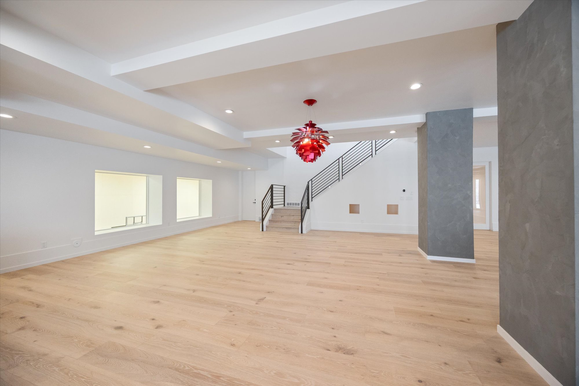 Unfurnished living room with recessed lighting and light wood finished floors