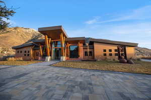 View of property with a mountain view
