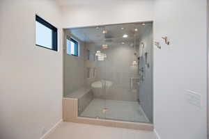 Full bath featuring a stall shower