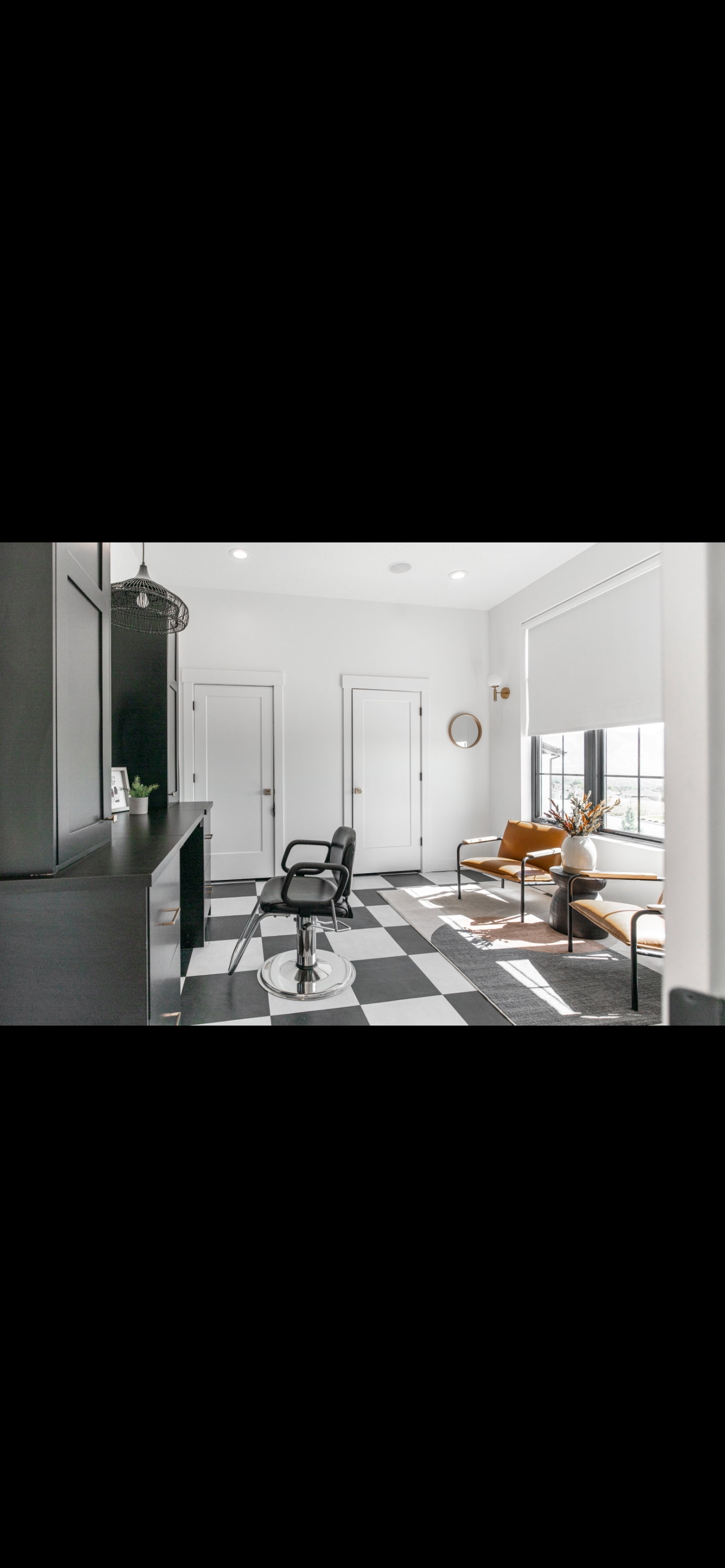 Kitchen with dark cabinetry