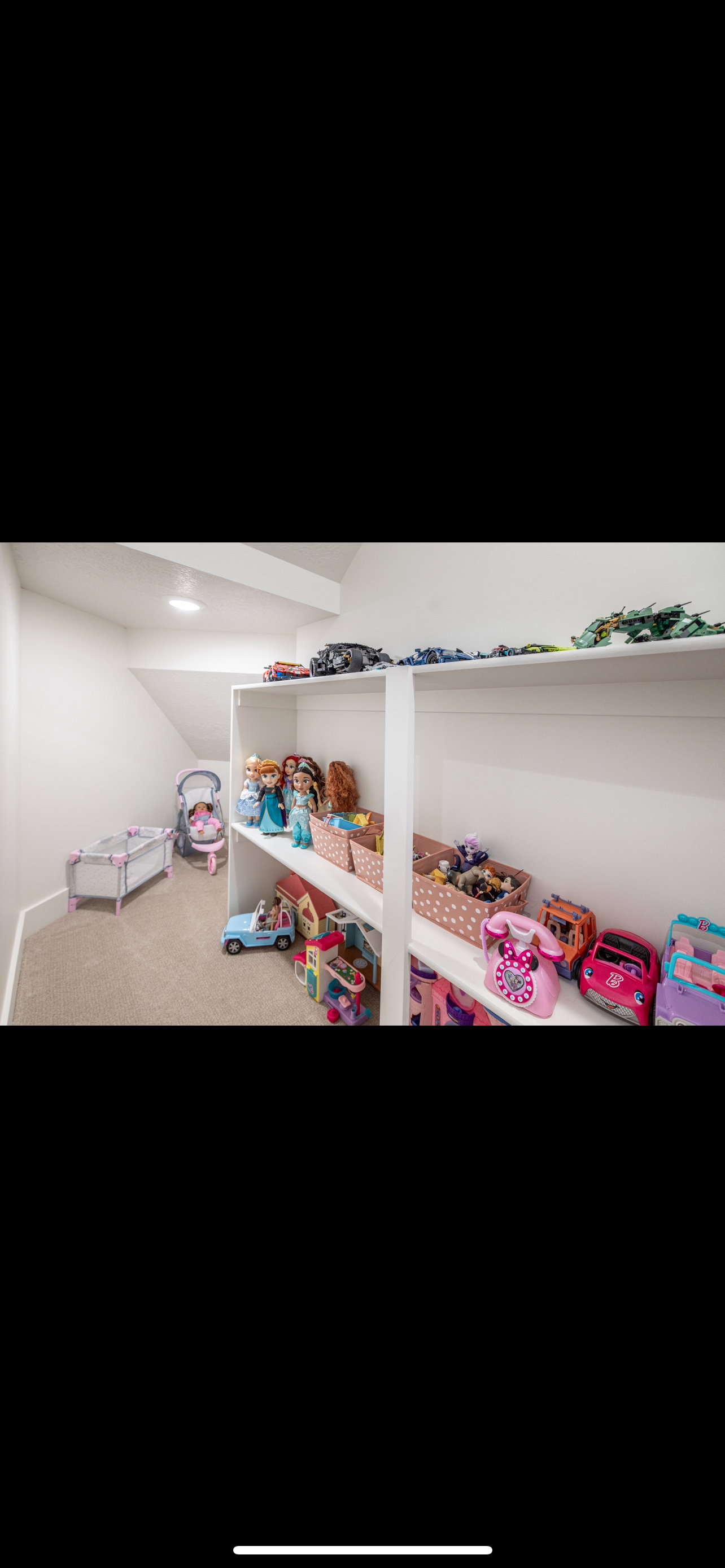 Rec room featuring carpet and baseboards