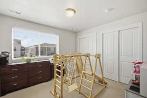 One of Two Additional Bedrooms