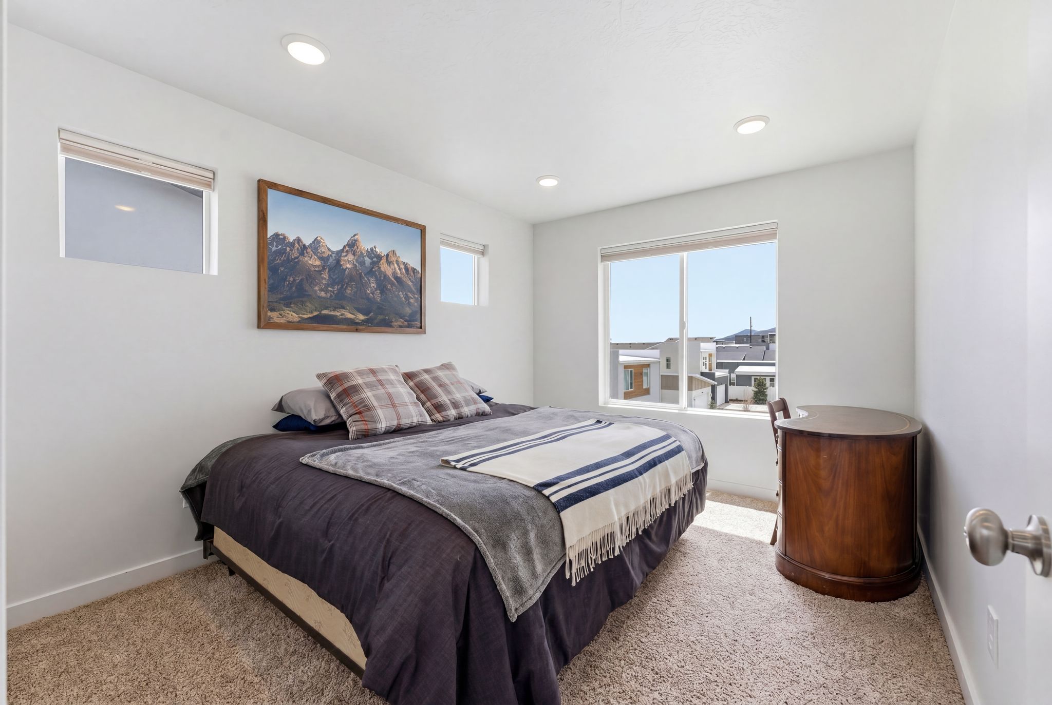 Bedroom featuring light carpet and recessed lighting