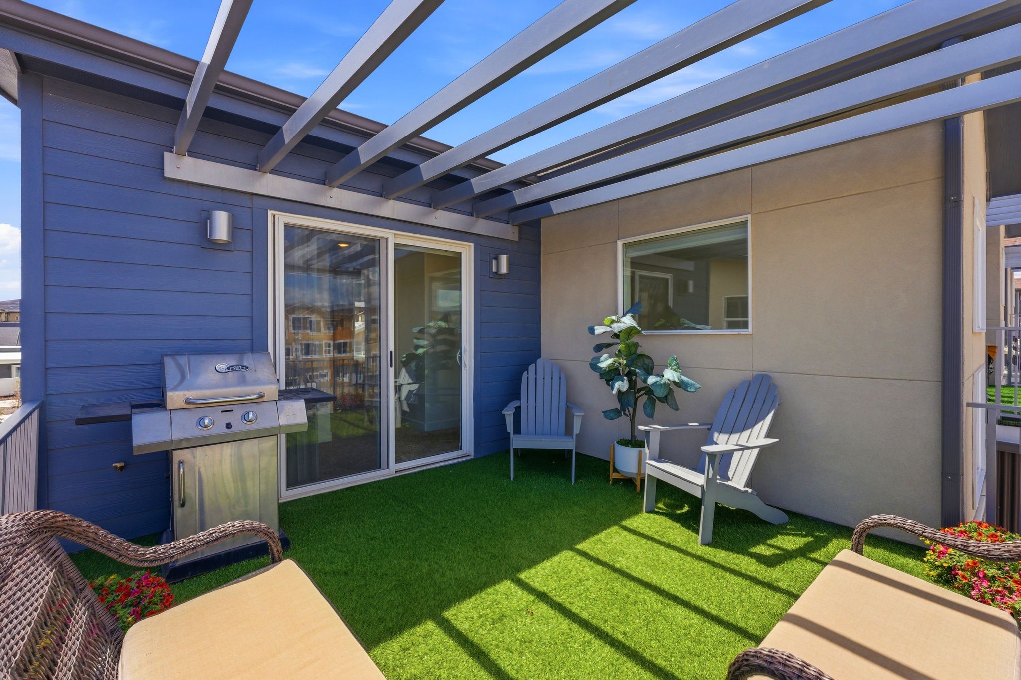 View of patio featuring a grill