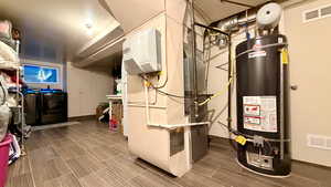 Utilities with gas water heater and heating unit