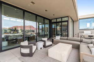 View of patio / terrace with an outdoor hangout area and a grill