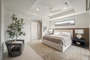 Bedroom featuring light tile patterned floors, a ceiling fan, and recessed lighting