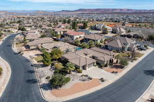 Aerial view of residential area featuring mountains