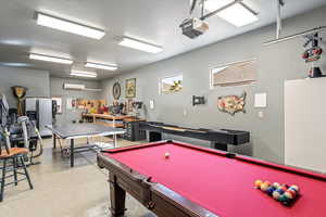 Rec room with dark speckled floor