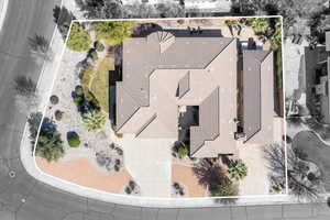 Aerial view of property and surrounding area featuring property parcel outlined