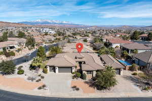 Aerial view of residential area featuring mountains
