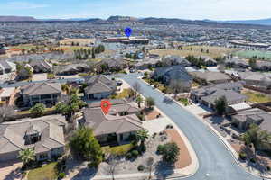 Aerial perspective of suburban area featuring mountains