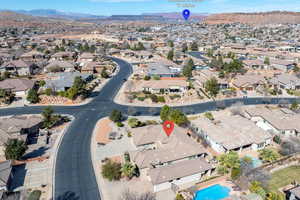 Aerial perspective of suburban area featuring mountains