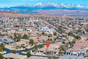 Aerial perspective of suburban area featuring mountains