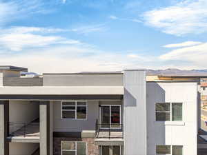 View of property with a mountain view