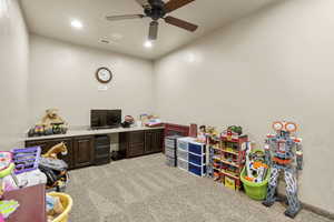 Game room with light carpet, ceiling fan, and recessed lighting