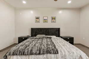 Bedroom with carpet floors and recessed lighting