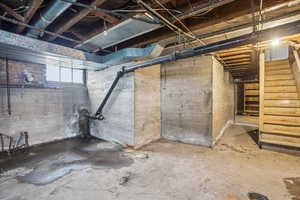 Below grade area featuring stairway