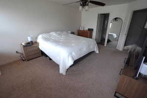 Main Bedroom with carpet, ceiling fan, and a closet