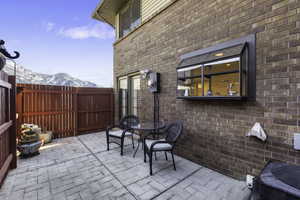 View of patio / terrace featuring a mountain view