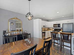 Dining room featuring recessed lighting