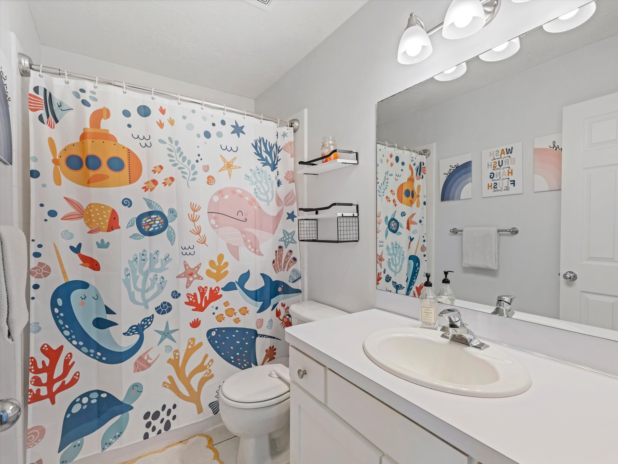 Bathroom with vanity and a shower with curtain