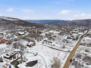 Mountain view featuring nearby suburban area