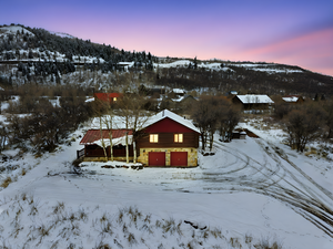 Snowy aerial view with a mountain view