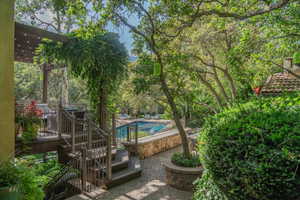 Community pool with a patio area
