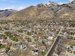Aerial view of property's location with nearby suburban area