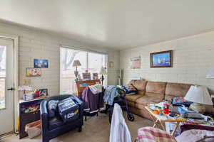 Living area featuring carpet