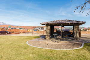 View of yard with a patio, a mountain view, and a gazebo