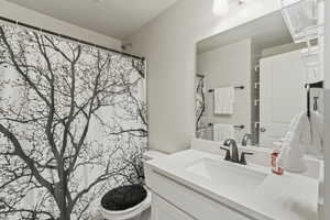 Full bathroom featuring vanity and tub/shower combo