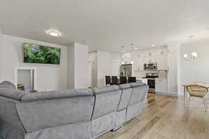 Large family room open to the kitchen and dining area