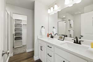 Primary bathroom with large vanity with double sinks