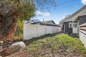 View of yard with entry steps