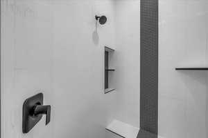 Bathroom view of a tile shower