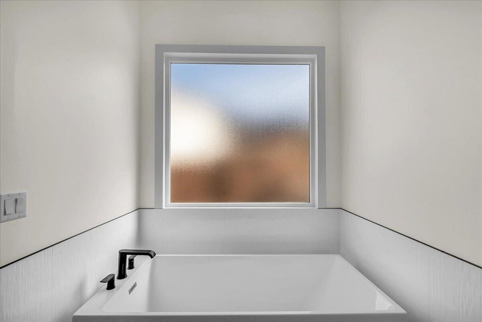 Full bath with a bath