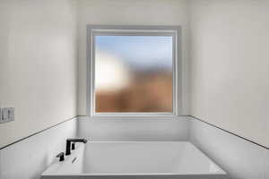 Full bath with a bath