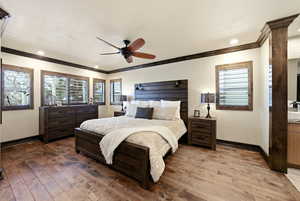 Bedroom with multiple windows, a ceiling fan, light wood-type flooring, recessed lighting, and ornamental molding