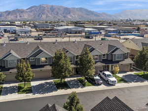 Aerial view of residential area featuring mountains